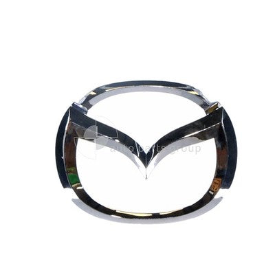 Genuine Mazda 2 2C/BK/GG/GY Grille Emblem (07/02-10/19)