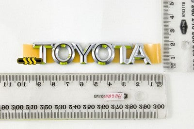 Genuine Toyota Corolla 94-On Badge/Logo *Toyota* On Boot Lid (10/99-11/01)